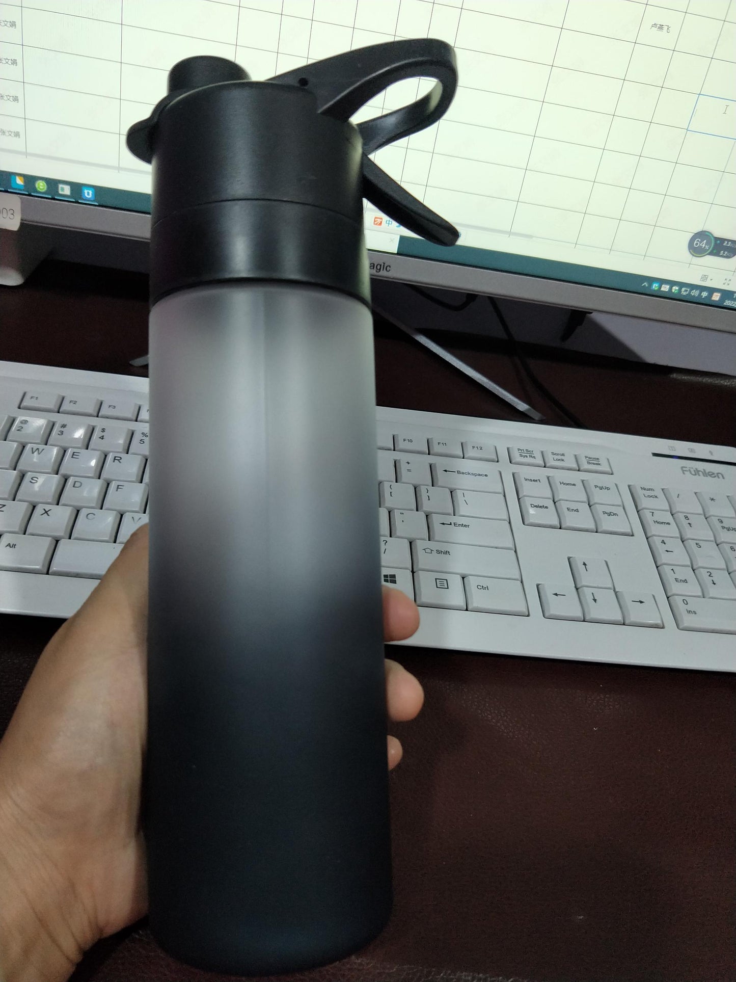 Stay Hydrated Anywhere: Leakproof Spray Water Bottle with Convenient Handle Strap